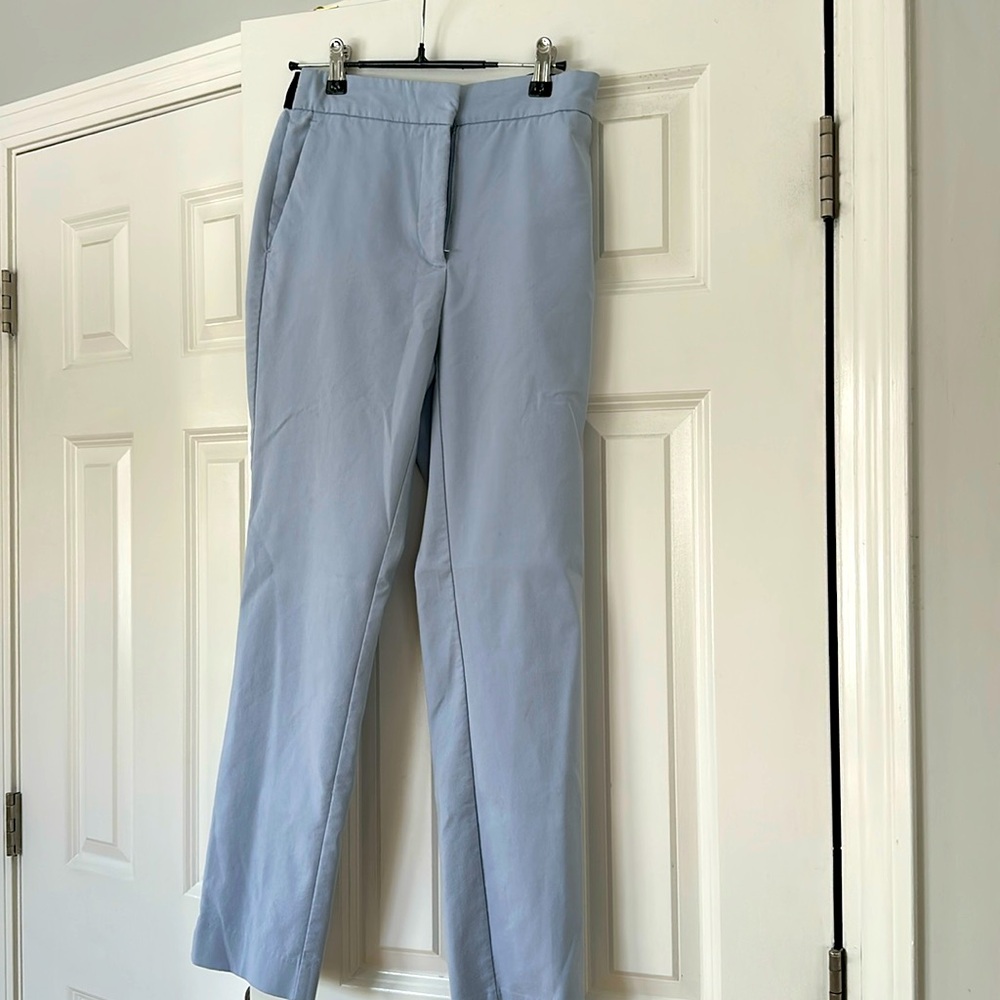 Zara light blue medium pants with stretchy black elastic on back belt area.